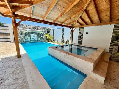an image of a swimming pool in a house at magnifica villa en cabrera in Cabrera