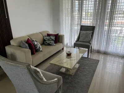 a living room with a couch and a table and a chair at Margarita 4toB in Marilópez