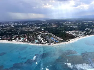 an aerial view of a beach and the ocean at Jojo's Caribbean Retreat in Punta Cana