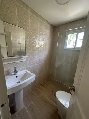 a bathroom with a sink and a toilet and a mirror at The best place to rest, Arenas del Caribe in Punta Cana
