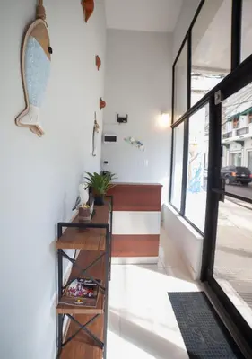 a room with a window and a shelf with a mirror at JEYMAR STUDIO rd in Santo Domingo
