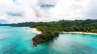 an island in the middle of a body of water at Lives off Colorada Beach in La Colmena