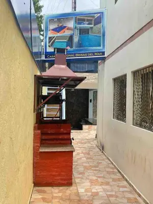 a stairway leading to a building with a painting at Acogedora Casa Vacacional in Colorado