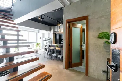 a kitchen and dining room with a dining table at PH Loft, 3floors,Private Jacuzzi n terrace,Kingbed in Santo Domingo
