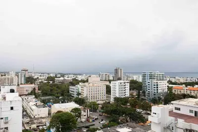 an aerial view of a city with tall buildings at PH Loft, 3floors,Private Jacuzzi n terrace,Kingbed in Santo Domingo