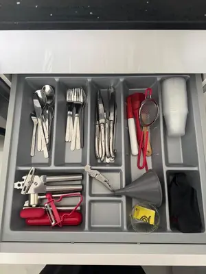 a drawer filled with utensils in a container at Canarock Beach Club in Punta Cana