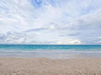 a view of the ocean from the beach at Penthouse con picuzzi privado y barbacoa en Bávaro in Punta Cana