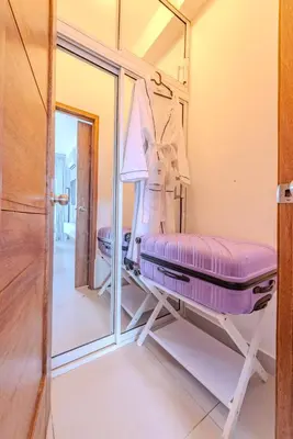 a hospital room with a bed and a mirror at Ventanas del mar in Los Corrales
