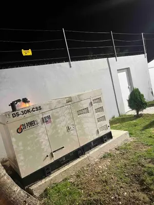 a utility box sitting on the side of a house at Villa Gordon in Santa Cruz de Barahona