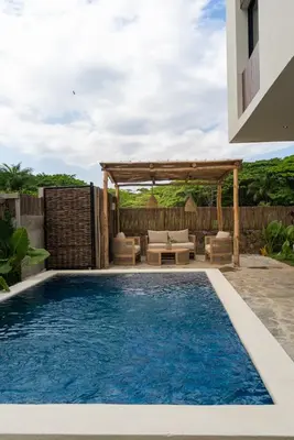 a swimming pool with a gazebo and a swimming pool at Casa Sharon in El Valle