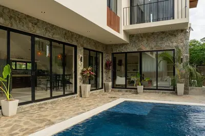 a house with a swimming pool in front of it at Casa Sharon in El Valle
