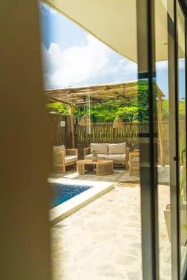 a view of a patio with a couch and a pool at Casa Sharon in El Valle