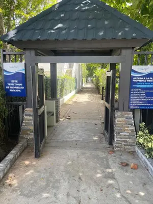 an entrance to a building with a roof at Luxury apartment Playa Dorada in Puerto Plata