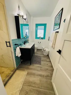 a bathroom with a sink and a toilet at Las Terrenas La Dolce Vita 7, Captivating and Exciting in Las Terrenas