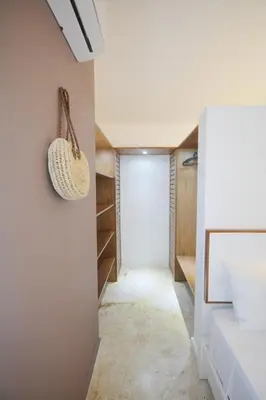 a hallway with a door leading to a closet at House with pool 300 m from Las Ballenas beach in Las Terrenas