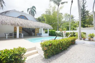a villa with a swimming pool and a resort at House with pool 300 m from Las Ballenas beach in Las Terrenas
