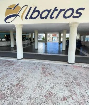 a building with a sign on the side of it at Juan Dolio paradise in Villas del Mar