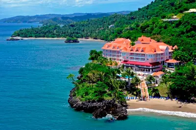 an island in the ocean with a large building at Bahia Principe Grand Samana - Adults Only in Santa Bárbara de Samaná