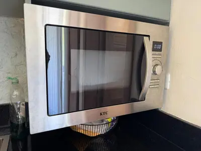 a microwave oven sitting on top of a counter at Luxury apartment in Cabrera in Cabrera