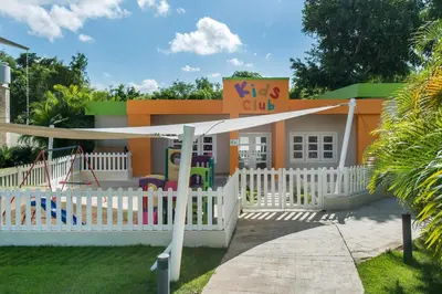 a playground in front of a house at Emotions by Hodelpa - Juan Dolio in Juan Dolio