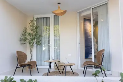 a room with two tables and chairs and a window at Xanadú in Sampiño