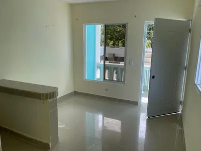 an empty room with a door and a window at Alexel Property