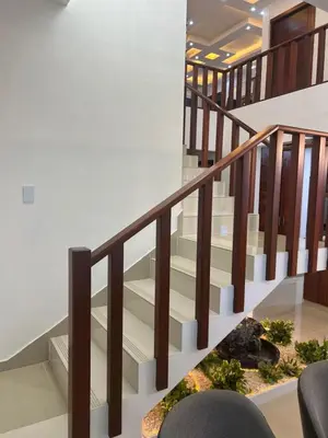 a staircase in a house with a plant at Residencial Pancho III in Los Mameyes