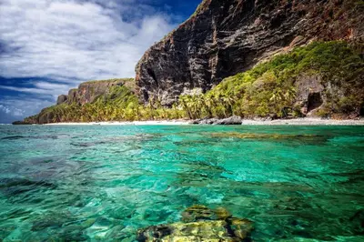 a view of the ocean near a rocky beach at Coco's Apartment near La Playita beach in Las Galeras