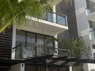 an external view of a building with a balcony at Escapada perfecta, apartamento frente al mar in San Felipe de Puerto Plata