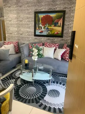 a living room with a couch and a table at Casa Mamá Tere in Pantoja