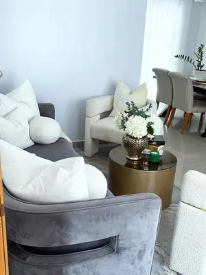 a living room with a couch and a table at Family-friendly apartment near the beach in Boca Chica