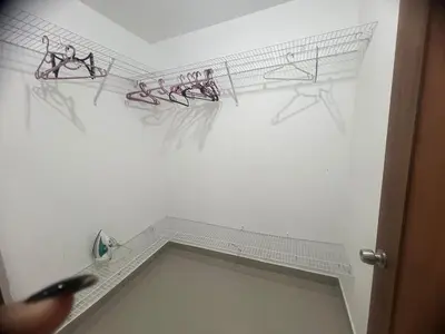 a bathroom with some drawings on the wall at Moderno y amplio apartamento en Santiago in Carlos Guerra