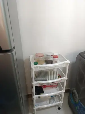 a refrigerator with a white dish rack in a kitchen at Comfort, safety and close to everything in Los Paredones