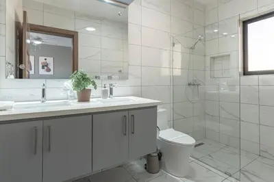 a bathroom with a sink and a toilet and a shower at Privacy, Big, Exclusive in Sosúa in Sosúa