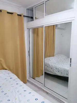 a bedroom with a sliding glass door with a bed at Studio Apartment 5 - SML Garden in La Romana