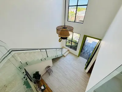 an overhead view of a staircase in a house at Villa Aguacate Near the Beach in Juan Dolio