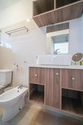 a bathroom with a sink and a toilet at Le Camere Del Maestro in Bayahibe