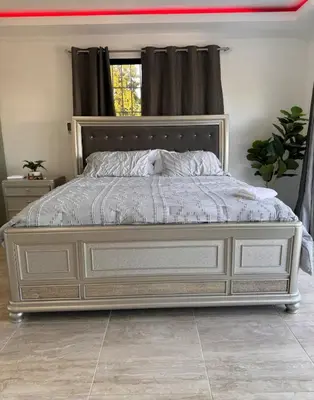 a bedroom with a large white bed in a room at villas el guano in Sosúa