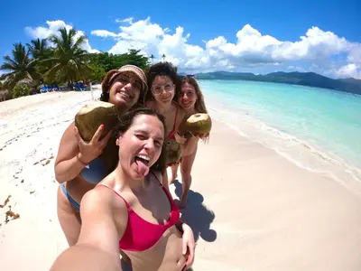a group of girls in bathing suits on a beach at Villa KAMBUSA appartamento SOFIA in Las Galeras