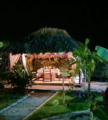 a house with a table and aentedented at Villa KAMBUSA appartamento SOFIA in Las Galeras