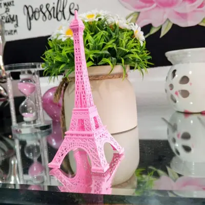 a pink plastic figurine of the eiffel tower at Prados de la Montana in Bartola