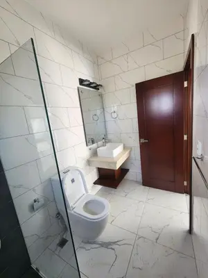 a bathroom with a toilet and a sink at Villa in SOV, close to Santa Fe in Sosúa
