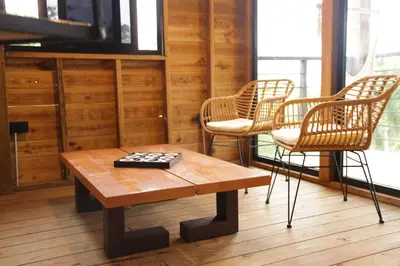 a room with a table and two chairs and a chessboard at Casa Loma, Descansar en la Montaña, 30min STG in La Búcara