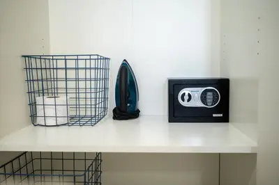 a shelf with a toaster and a basket on it at Studio 3 Zona Colonial - Centro Histórico in Santo Domingo