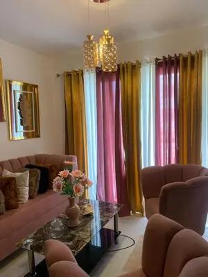 a living room with a couch and a table at Residencial habitat uno in Los Paredones