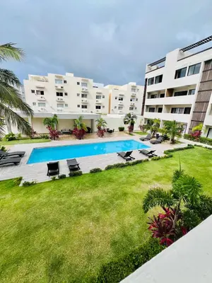 an image of an apartment complex with a swimming pool at Caribbean dream in Punta Cana in Colorado