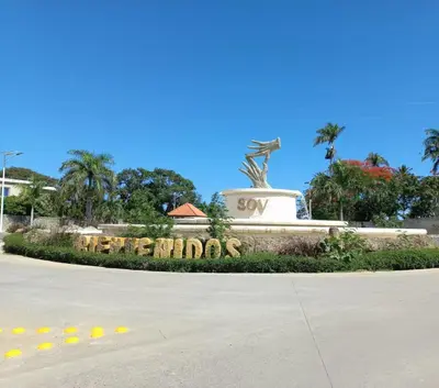 a statue in the middle of a street at Laguna del Sol in Sosúa