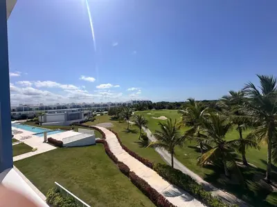 an aerial view of a resort with a pool and palm trees at PentHouse Jakuzzi Hotel Hard Rock in Punta Cana