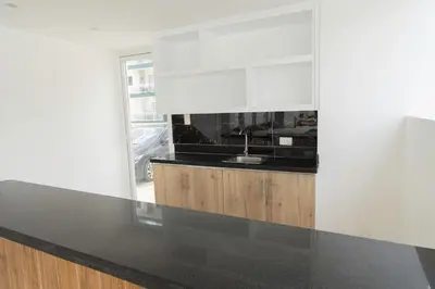 a kitchen with a sink and a counter at SoliMar Caribeño in Boca Chica