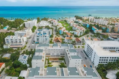 an aerial view of a city with the ocean at Brand New 2BR Stylish Apartment in the Heart of Punta Cana, Gardenia Gated Community in Punta Cana